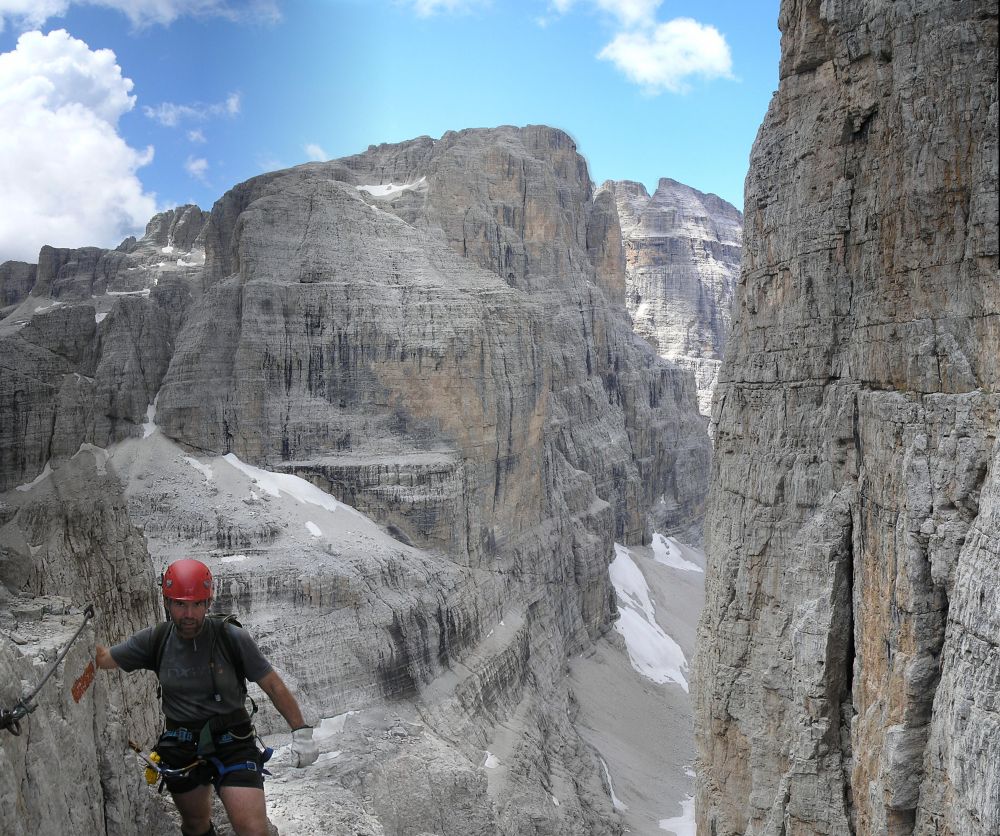 Tony on a via ferrata in a mountainous landacape of ice and bare rock
