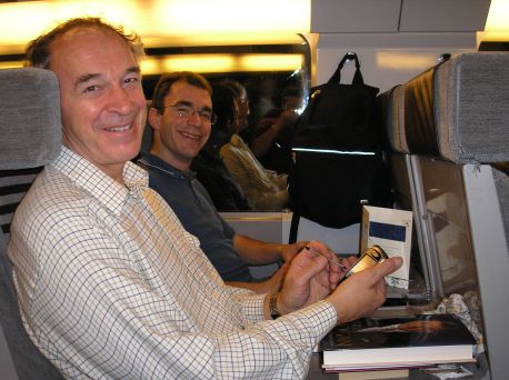 Dad and Earl on the train in a tunnel under Lille